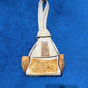 Backpack/shoulder sling leather bag